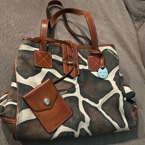 Dooney and bourke giraffe print cloth bag with leather accents